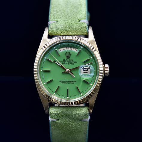 vintage green rolex|Rolex with a green face.